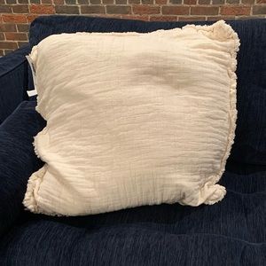 Cream throw pillow